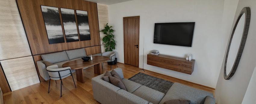 Sala y comedor con mesa ovalada y sillas de diseño